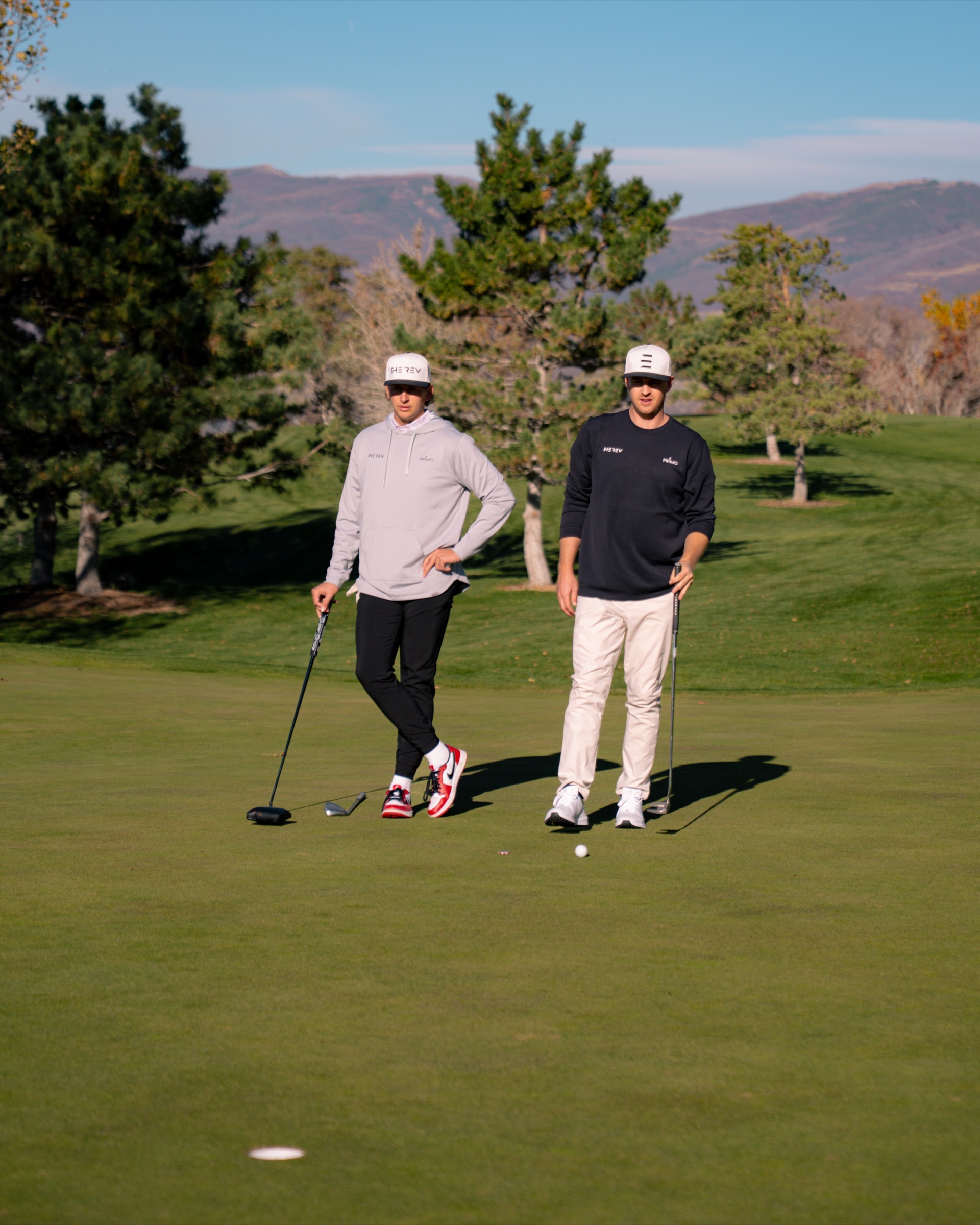 REV Tour players on the putting green